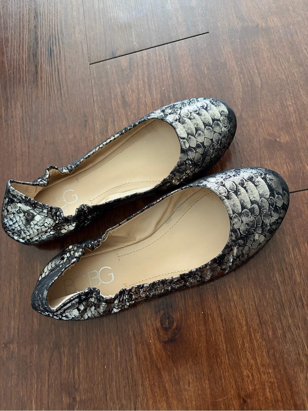 BCBG Metallic Snake-Print Ballet Flats in Silver and Black